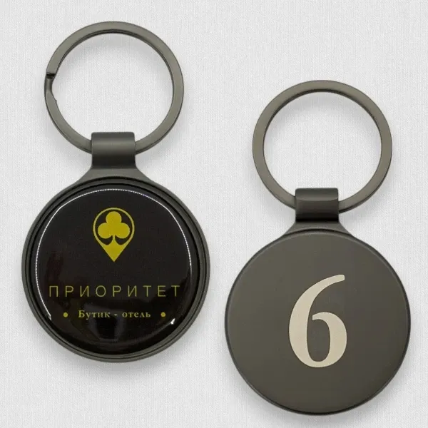 Номерок-брелок. Лазерная гравировка, полимерная наклейка. Номерок-брелок. Лазерная гравировка, полимерная наклейка.